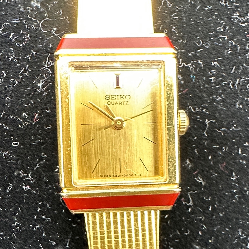 Seiko Gold Watch with Red Highlights